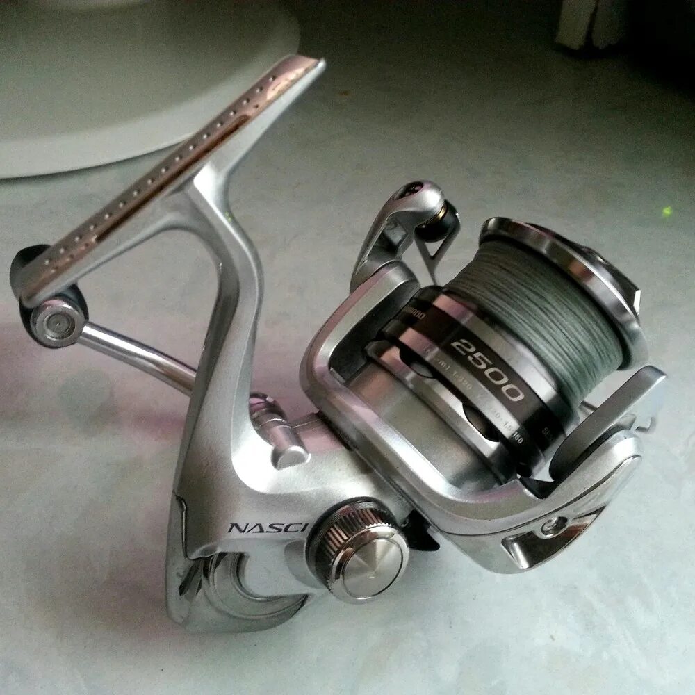 Шимано наски купить. Катушка Shimano c3000. Шимано Наски 13. Катушка Shimano Nasci c3000fc 2021. Шимано 13 Наски 2500.