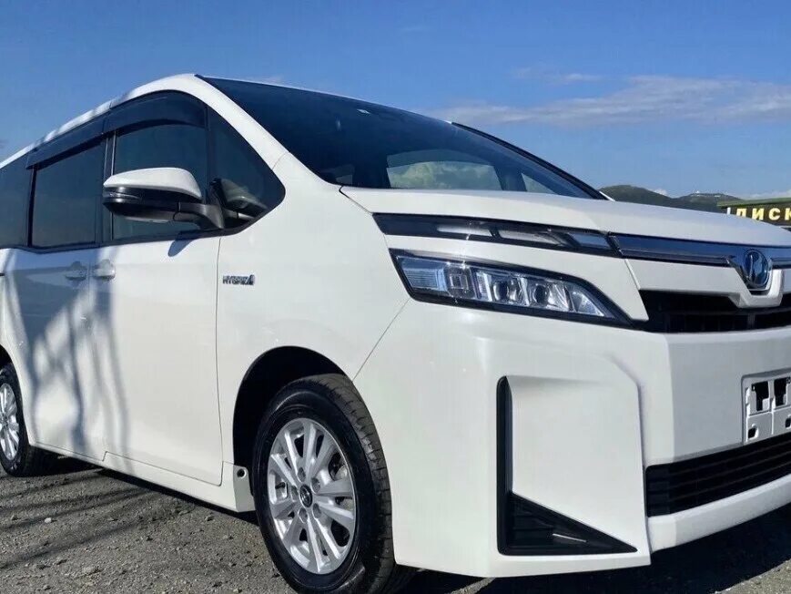 Toyota voxy hybrid 2014. Тойота вокси 2021. Тойота вокси гибрид. Тойота вокси 2016. Toyota voxy hybrid 2014.