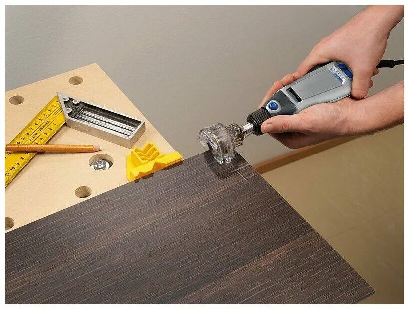 резак для ламината. распилить ламинат. распиленная поверхность ламината. реноватор для ламината. резка ламината без сколов.