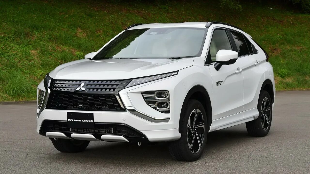 Mitsubishi новый год. Митсубиси Эклипс кросс 2021. Мицубиси Эклипс кросс 2021. Митсубиси Eclipse Cross 2021. Mitsubishi Eclipse 2021.