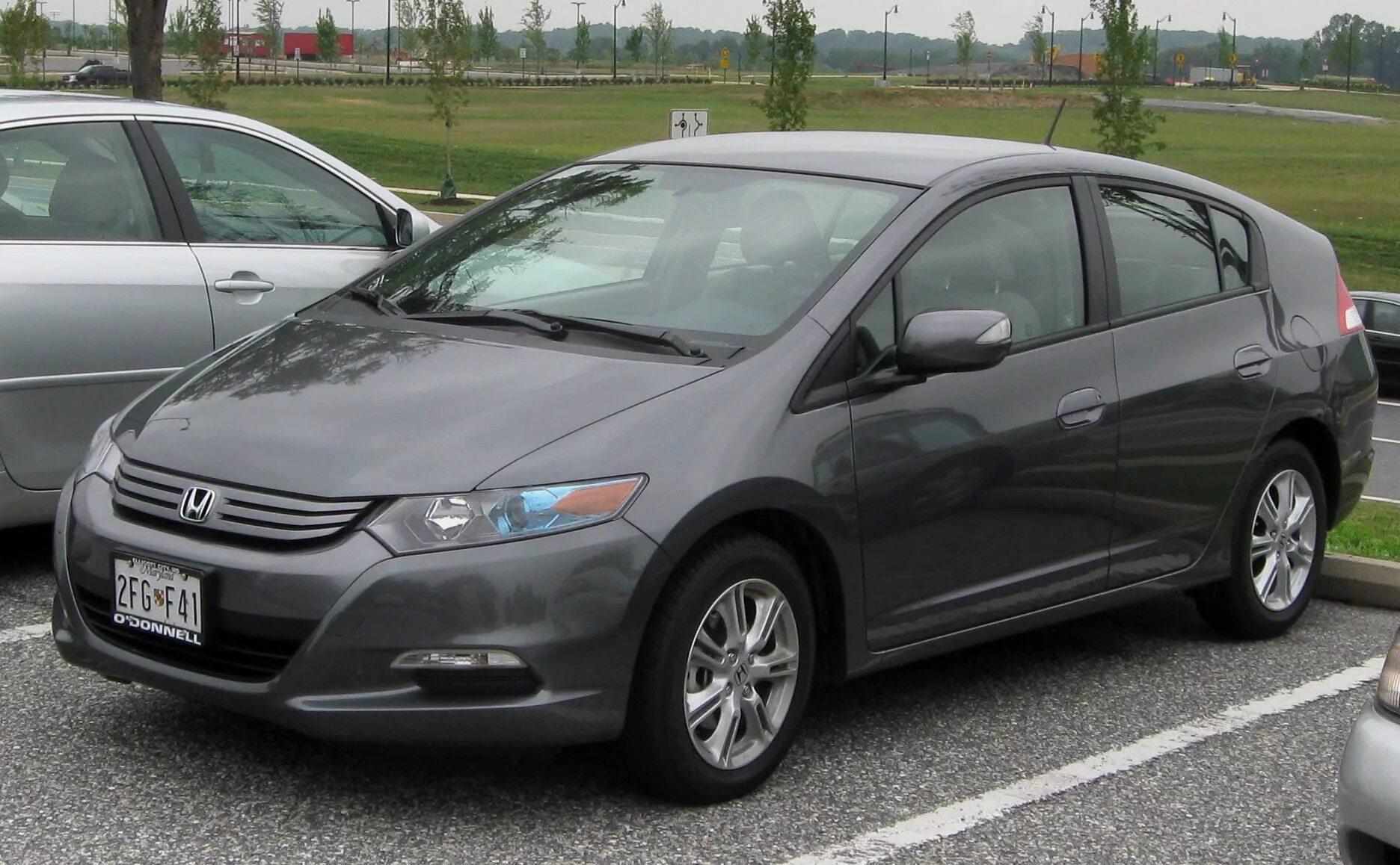 Insight 2009. Honda insight 2010. honda insight 1.3 g 2010. хонда инсайт 2009 серая. хонда инсайт серая.