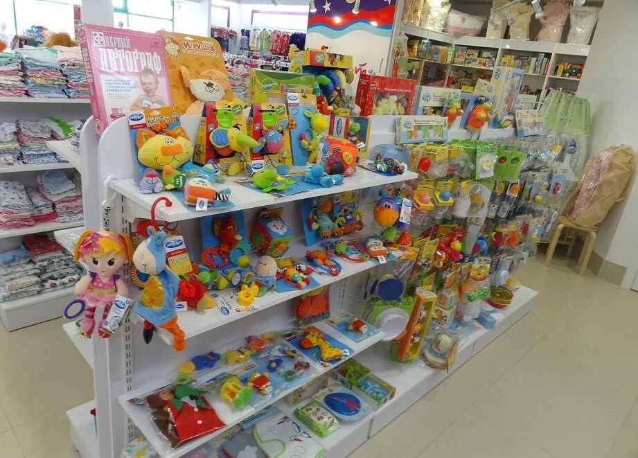 творческое рукоделие с детьми. оранжевый слон франшиза. набор для плетения бус. магазин детской одежды йошкар ола. выкладка детских товаров.