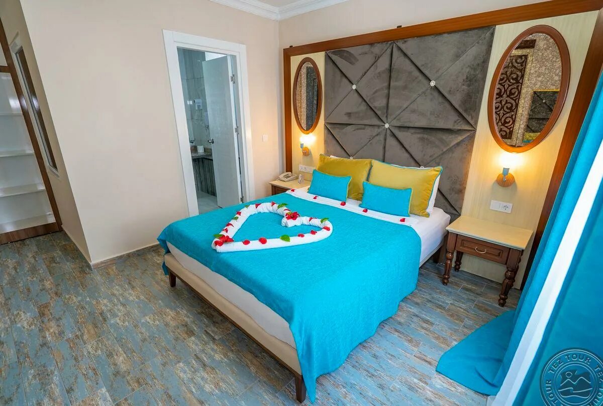 Отель club big blue suite hotel. Big blue suite hotel 4. Big blue suite hotel 4. Турция алания отель биг блю. Отель голубая волна турция аланья.