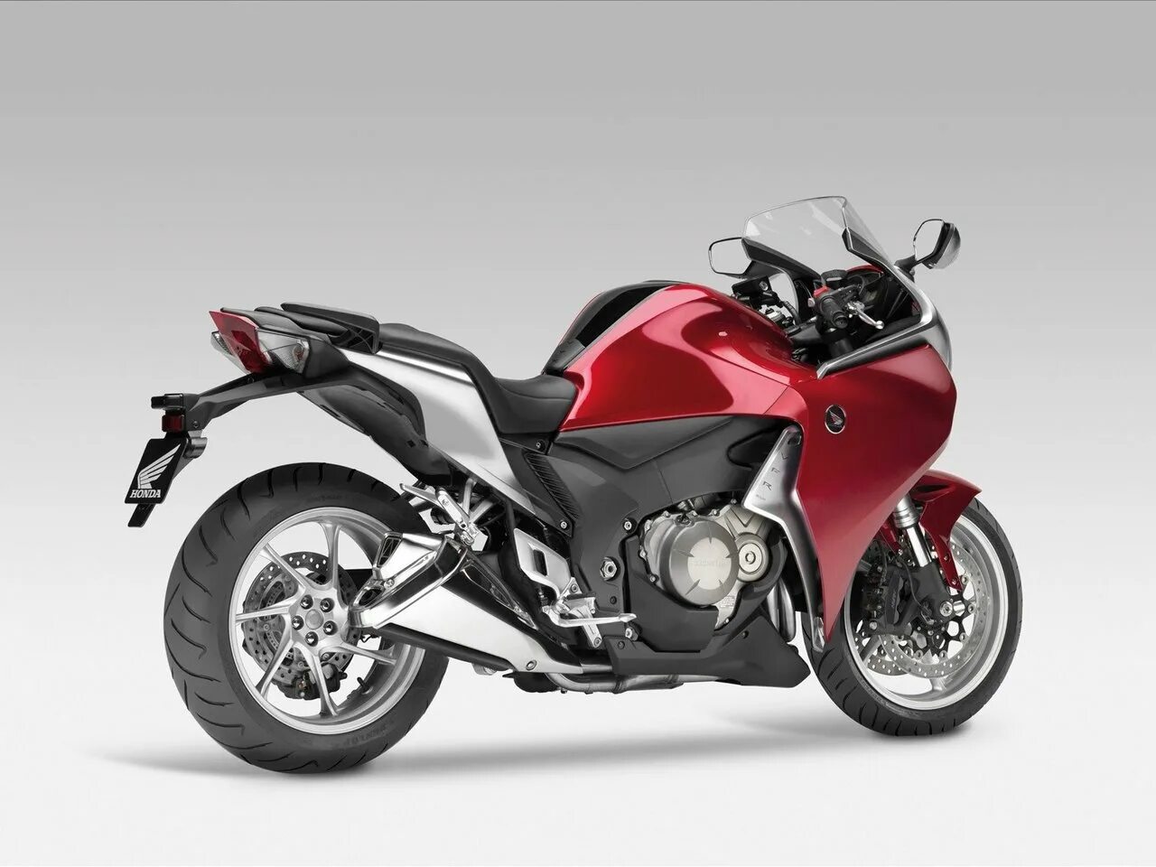 Мотоцикл honda vfr 1200. Honda 1200cc. Выхлоп honda vfr 1200. Хонда спорт турист 1200. Мотоцикл honda vfr 1200.