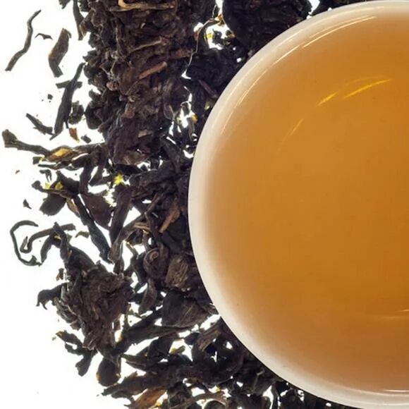 Вред китайского чая. Шен пуэр заваренный. Чай пуэр желтый. Желтый чай. Эффект от китайских чаев.