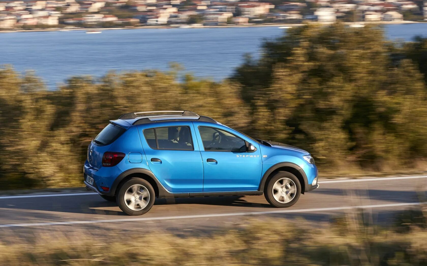Степвей видео. Дачия сандеро 2016 фото. sandero stepway на бездорожье. синий степвей фото.