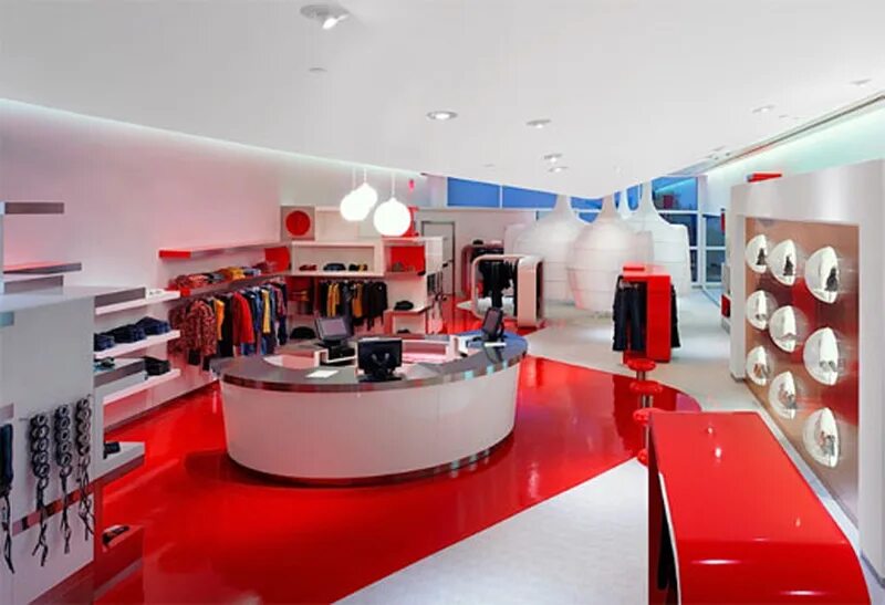Магазин красно синий. Красный интерьер магазин. Красный интерьер бутик одежды. Магазин красного цвета одежда. Дизайн магазина в Красном цвете.