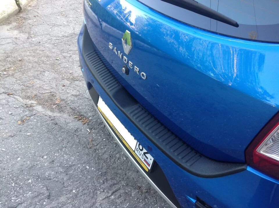 Рено логан степвей 2 задний бампер. Накладка бампера renault sandero stepway 2. защита бампера рено сандеро степвей 2. sandero stepway накладка заднего бампера. бампер рено сандеро степвей 2017.