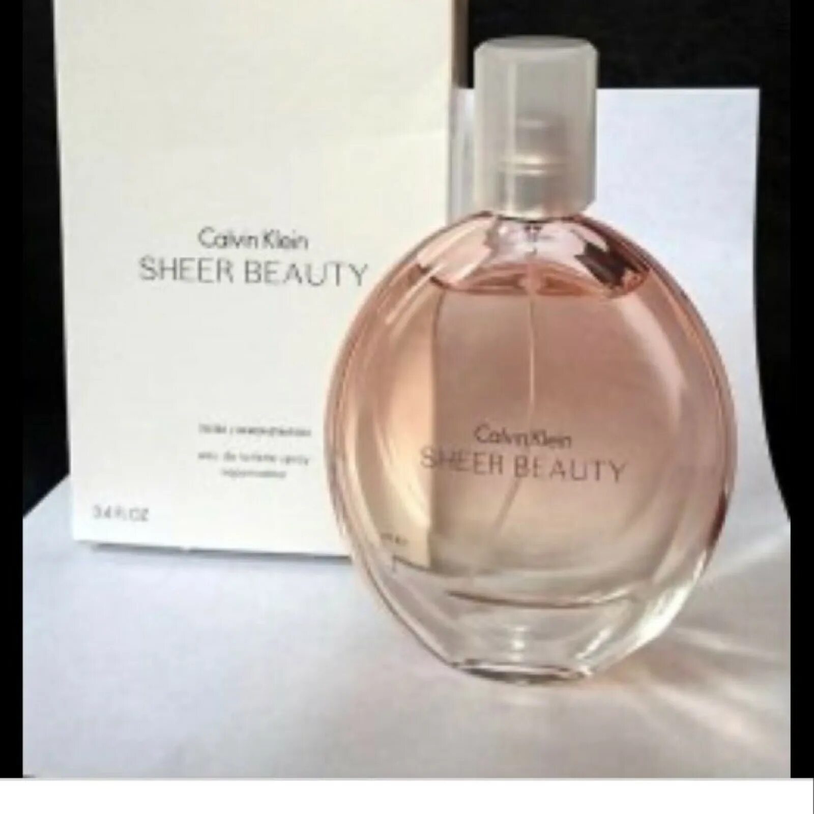 Кляйн шер. Кальвин Кляйн Sheer Beauty. Кельвин Кляйн духи Шер Бьюти. CK Beauty Sheer 100ml EDT Test. CK Sheer Beauty [l] [EDT 100] Tester.