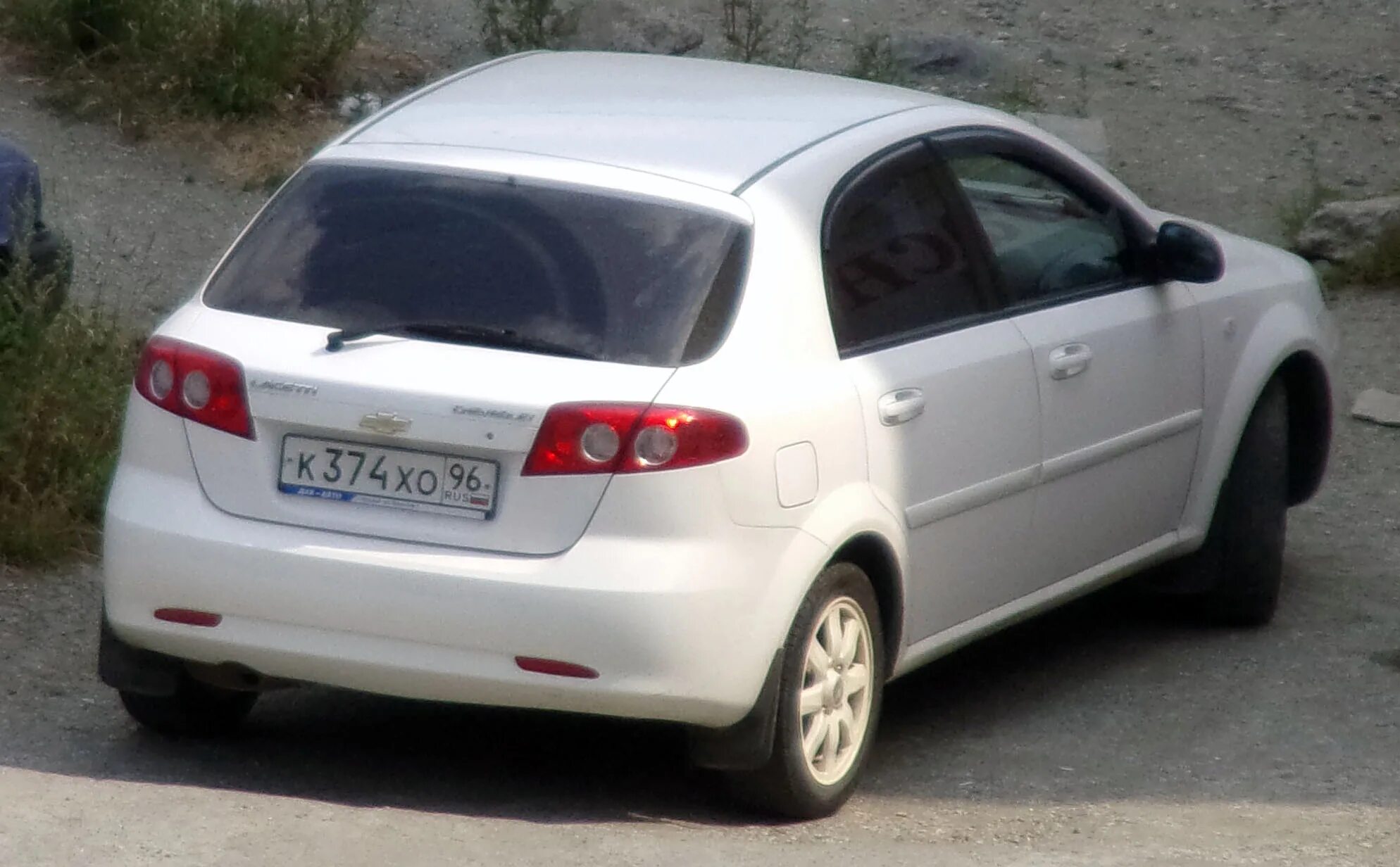 Купить лачетти свердловская область. Chevrolet Lacetti Hatch j200. К257хо174. Н755хо 40. К374сн 21.