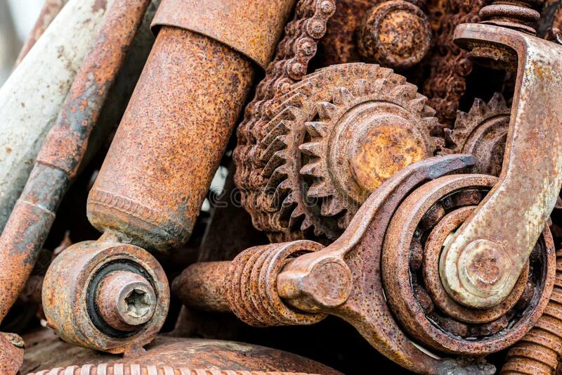 Старые детали. Ржавый металлолом. Запчасти для часов. Механизм из шестеренок. Поделки из хлама.