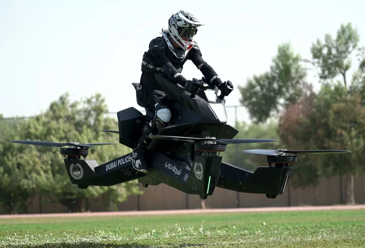 Летающий байки. Летающий мотоцикл Hoverbike s3. Ховербайк Скорпион 3. Ховербайк летающий Дубай полиция. Летающий мотоцикл концерн Калашников.