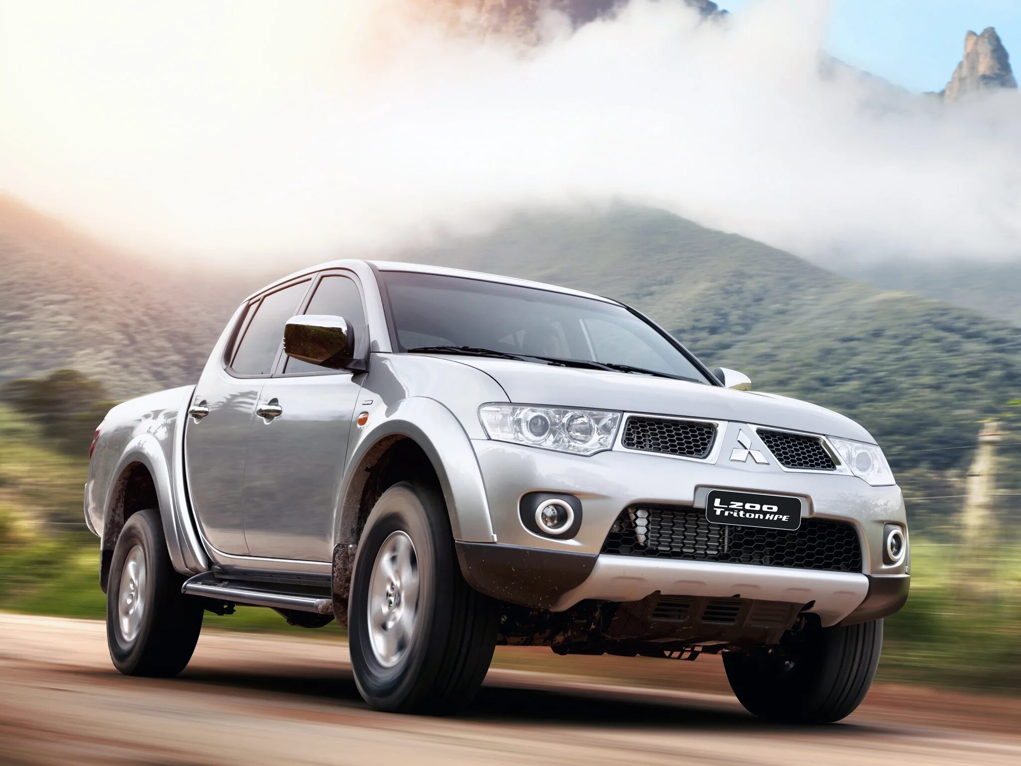 Митсубиси л200. Mitsubishi l200. Митсубиси л200 2012. Митсубиси внедорожник l200.