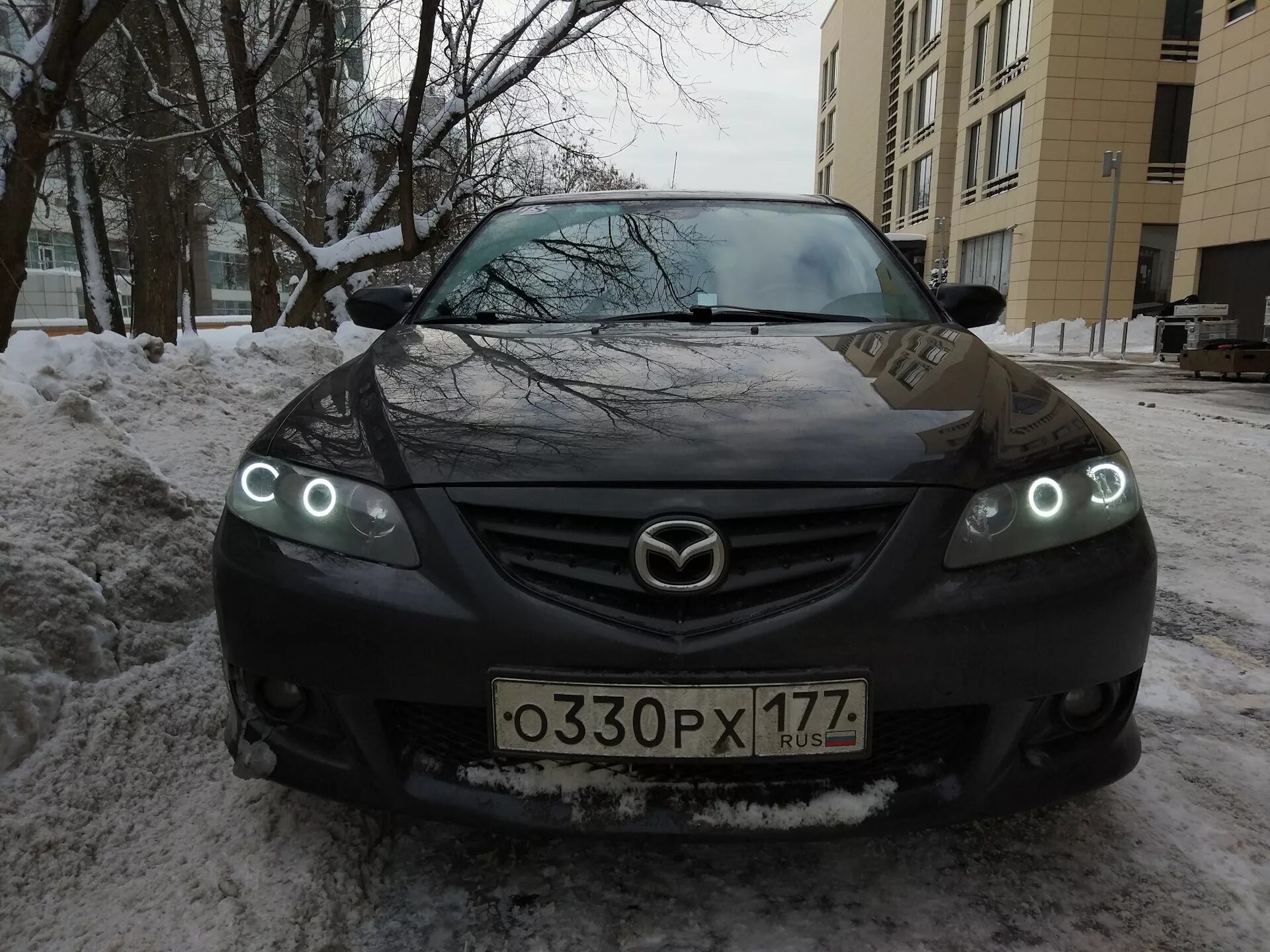 Тюнинг фар мазда. Mazda 6 gg ангельские глазки. Ангельские глазки Мазда 6 gg. Мазда 6 2004 черная. Фары на мазду 6 ангельские глазки.