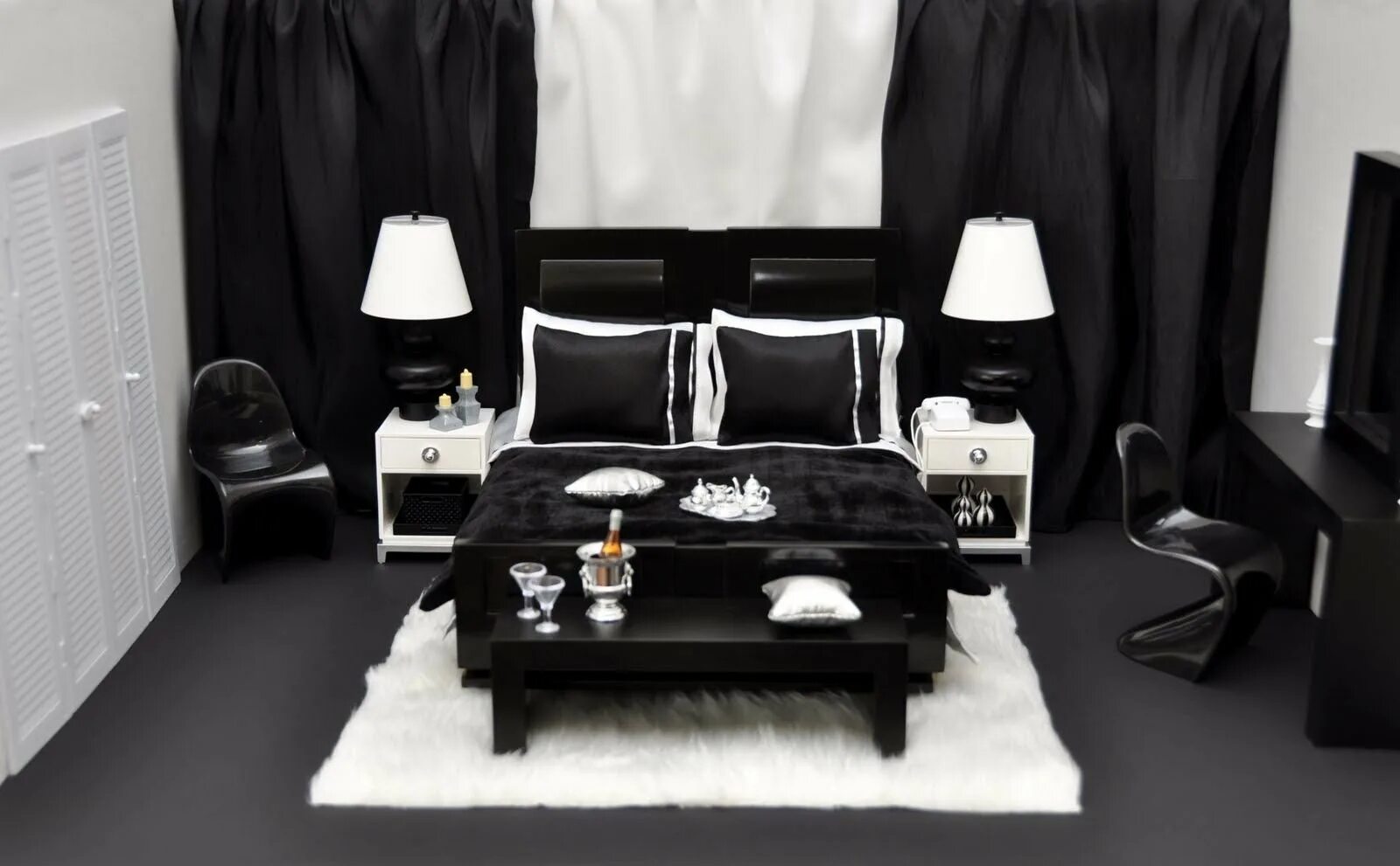 Интерьер в черных цветах. Белая комната с черной мебелью. Комната в черно белых тонах. Интерьер комнаты с черной мебелью. Интерьер комнаты в черном цвете.