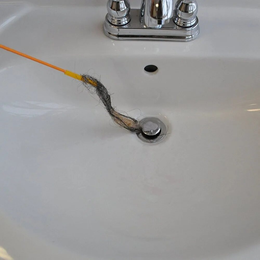 Как прочистить ванну от засора. Инструмент для чистки канализации the Drain Waesel Plus. Крючок для очистки раковины. Крючок для чистки слива в ванной. Крючок для очистки слива.