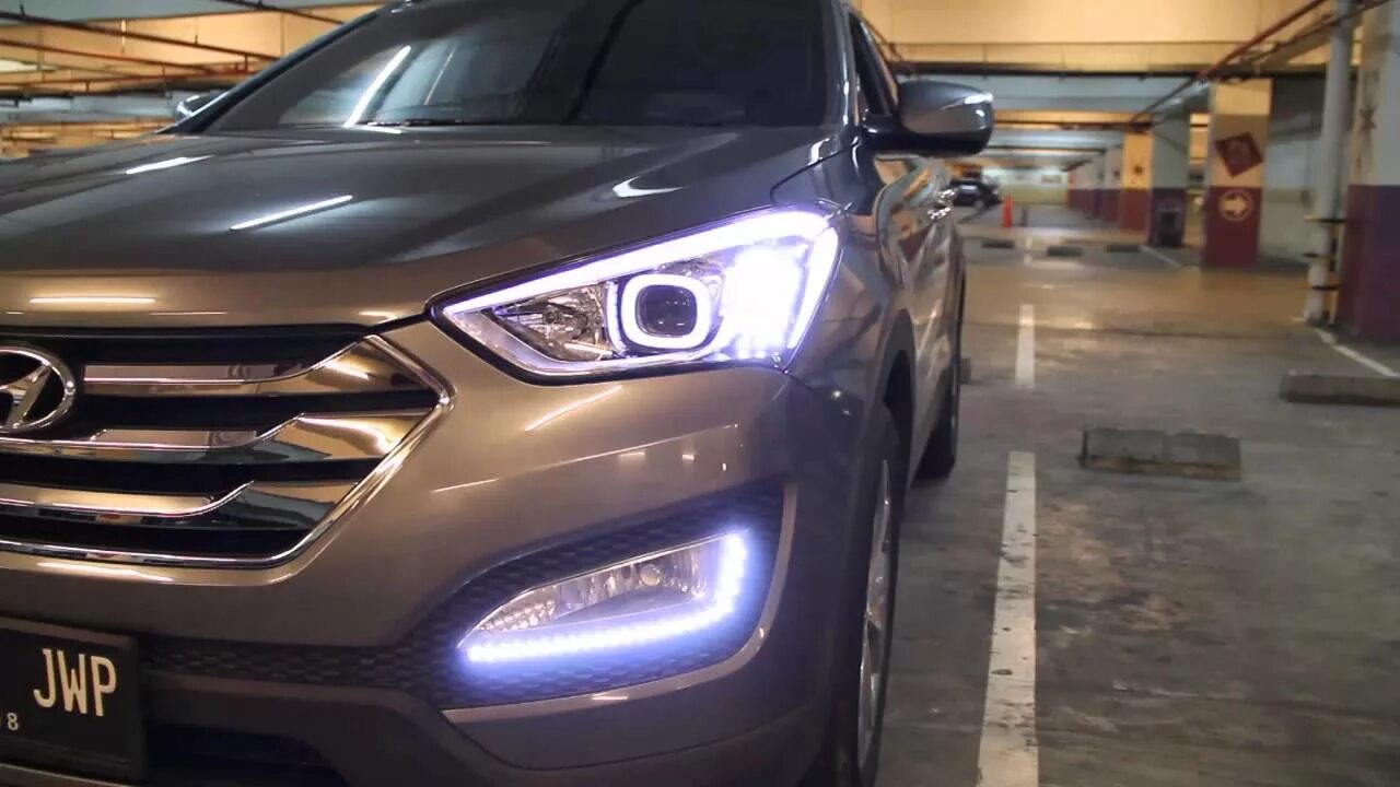 Ксенон санта фе. Фары Hyundai Santa Fe 3. Фары Хендай Санта Фе 2. Фара Санта Фе 3. Свет фар Hyundai Santa Fe 2014.