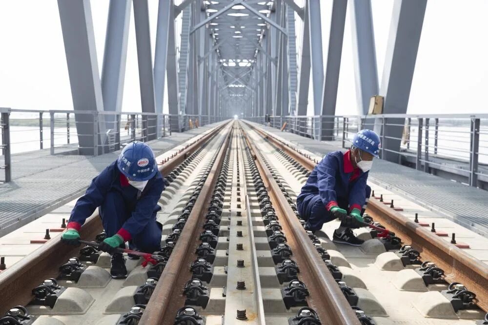 Мост Нижнеленинское Тунцзян через Амур. Железнодорожный мост через Амур в Китай. Железнодорожный мост Нижнеленинское. ЖД мост Нижнеленинское Тунцзян.