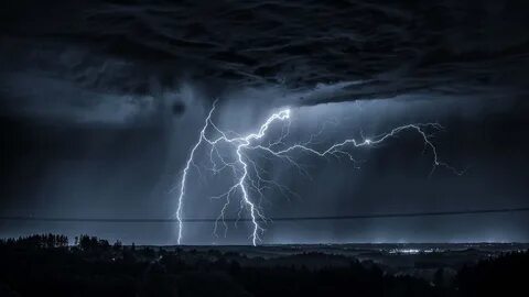 Download Dramatic Lightning Strike In 4k Resolution Wallpaper Wallpapers.co...
