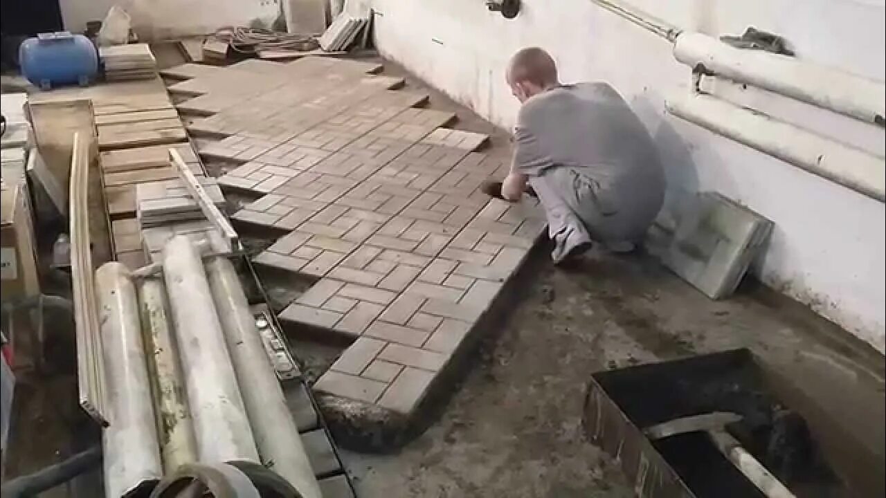 Как уложить пол в гараже. Тротуарная плитка в гараж на пол. укладываем тротуарную плитку в гараже. укладка тротуарной плитки в гараже. бетонная плитка в гараже.