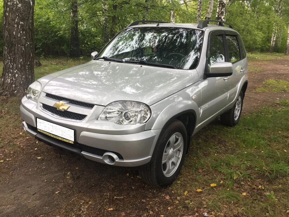 нива шевроле серебристого цвета. шевроле нива жидкое серебро 669. шевроле нива 2008 серебристый. нива шевроле серебристого цвета. нива шевроле серебристая.