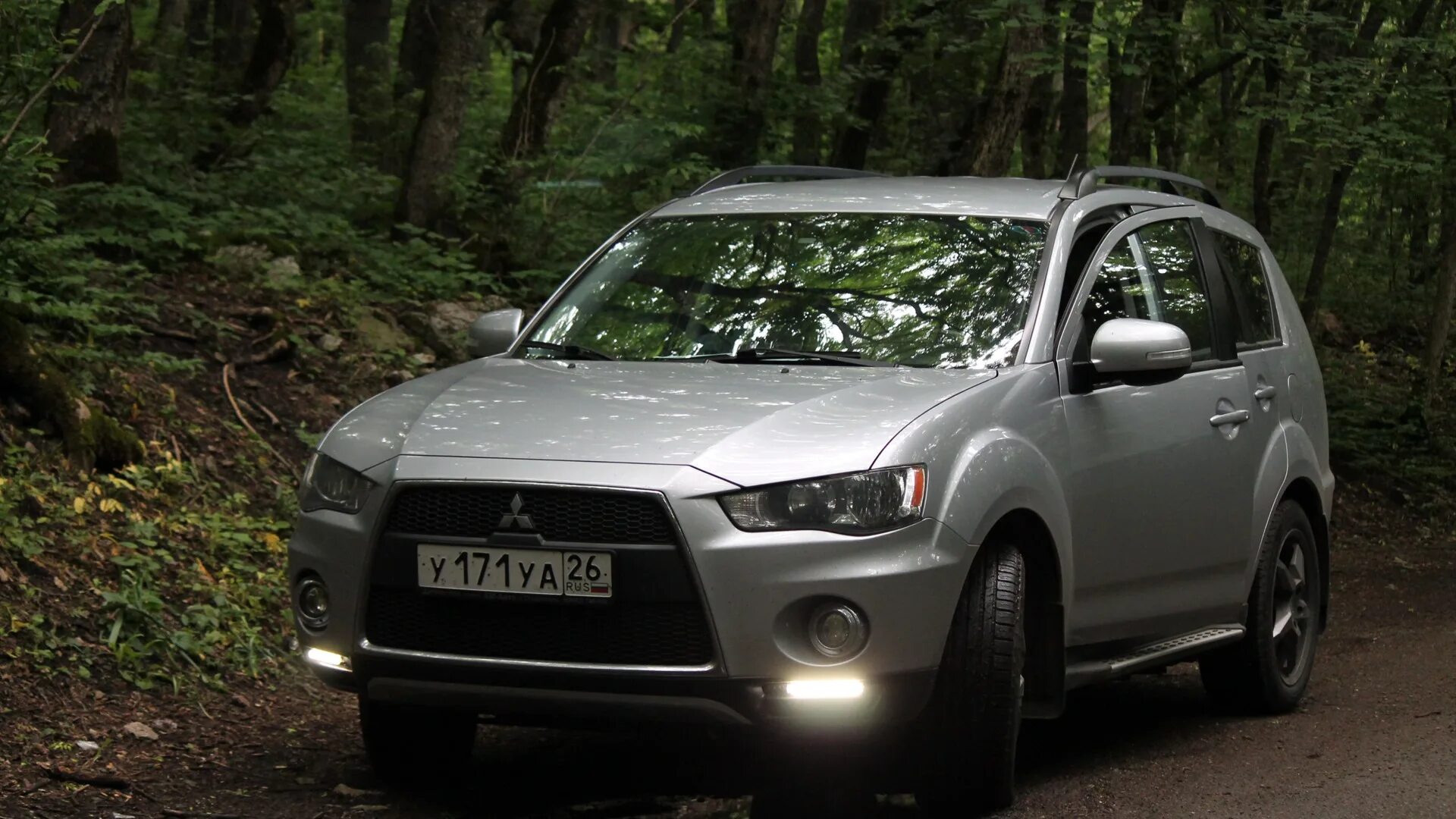 Аутлендер XL 2012. Митсубиси Аутлендер XL 2012. Mitsubishi Outlander XL 2012. Mitsubishi Outlander XL 2012 2.4. Мицубиси аутлендер хл 2.0