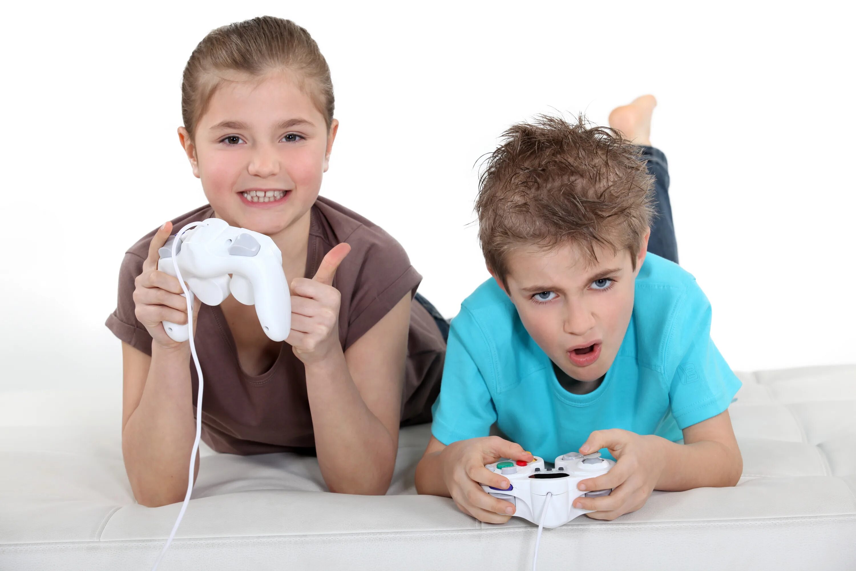 My brothers play computer games. Children Happy удивляются on the Computer. Boy playing Computer games. Teenage boy playing a Video game. Play Computer games with brother.