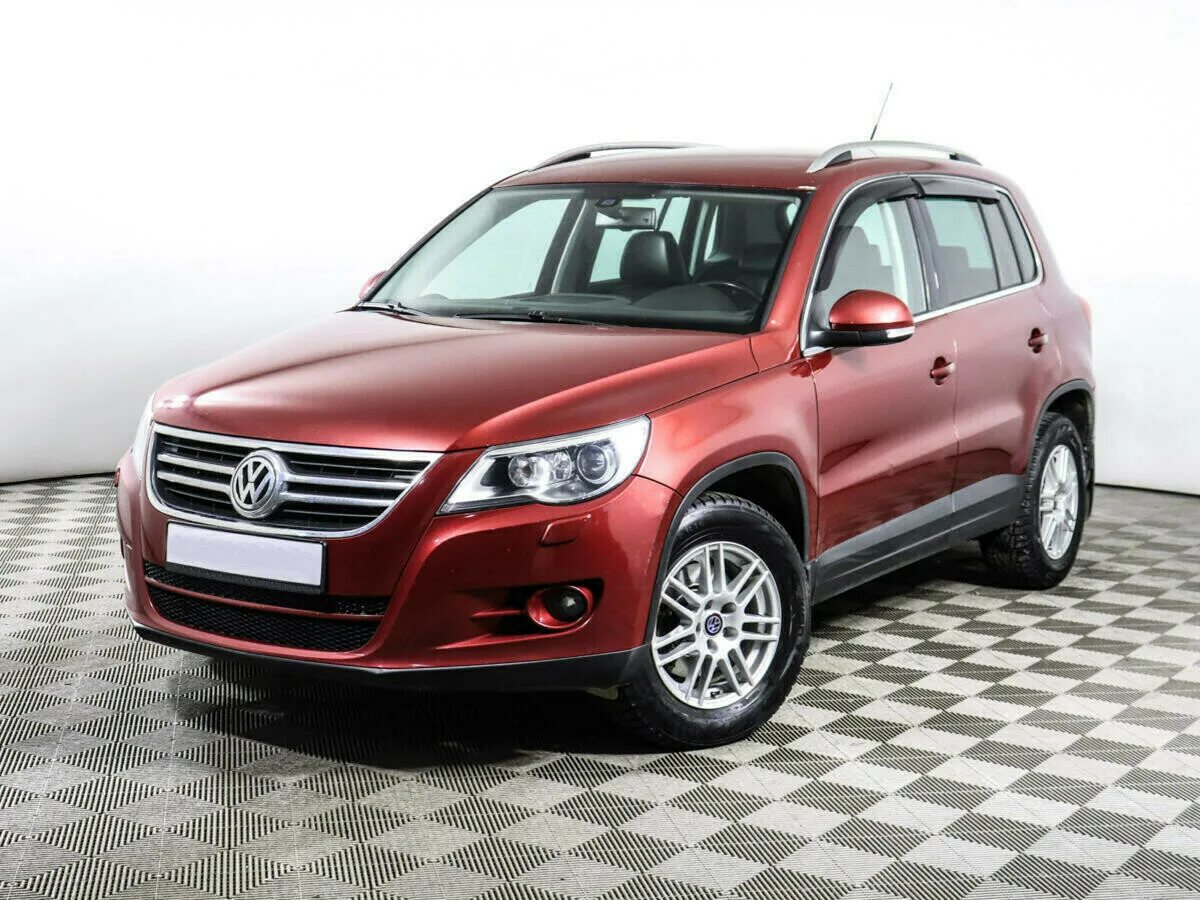 Volkswagen tiguan 2.0 at. VW Tiguan 2009. Фольксваген Тигуан красный 2009. Volkswagen Tiguan i 2009. Фольксваген Тигуан 2л.