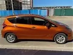 Nissan note he12. Ниссан ноут 2018 гибрид. Nissan Note e Power оранжевый. Ниссан ноут e-Power. Ниссан ноут оранжевый 2015.