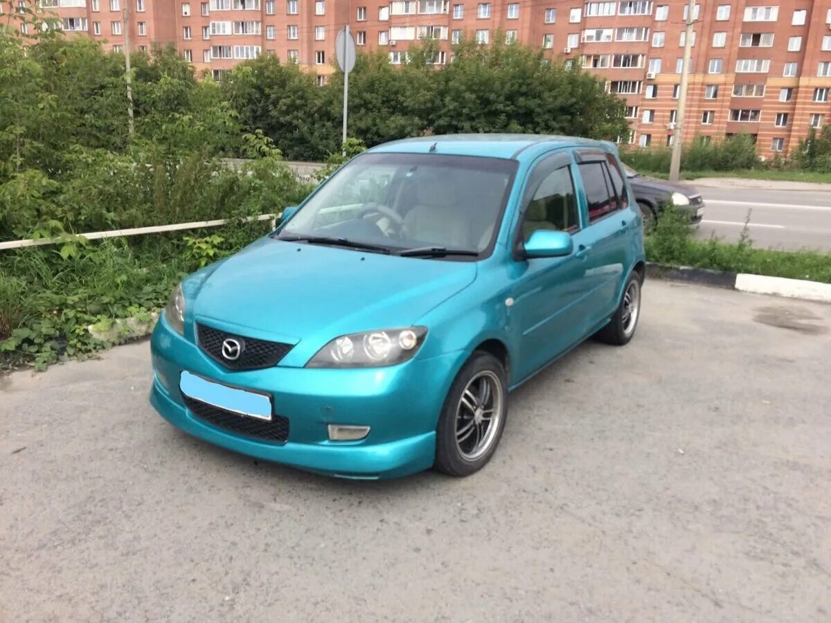 Купить мазду демио в новосибирске. Mazda Demio/2. Mazda Demio 2002. Мазда Демио 2003 зелёное. Mazda Demio зеленая.