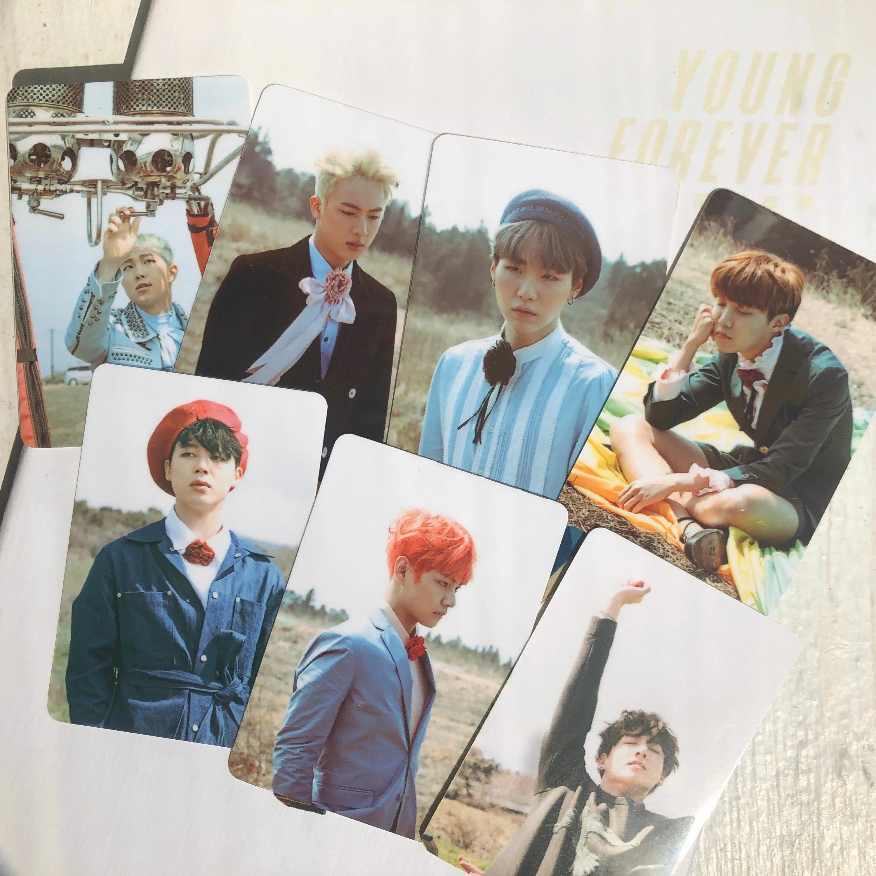 Узнай бтс. Эры БТС. BTS young Forever Photocards. BTS young Forever album Cards Original. Итси кпоп.