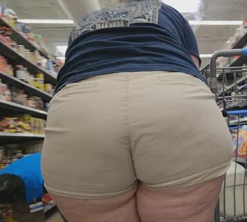 Thick Married BBW PAWG Milf in beige shorts.
