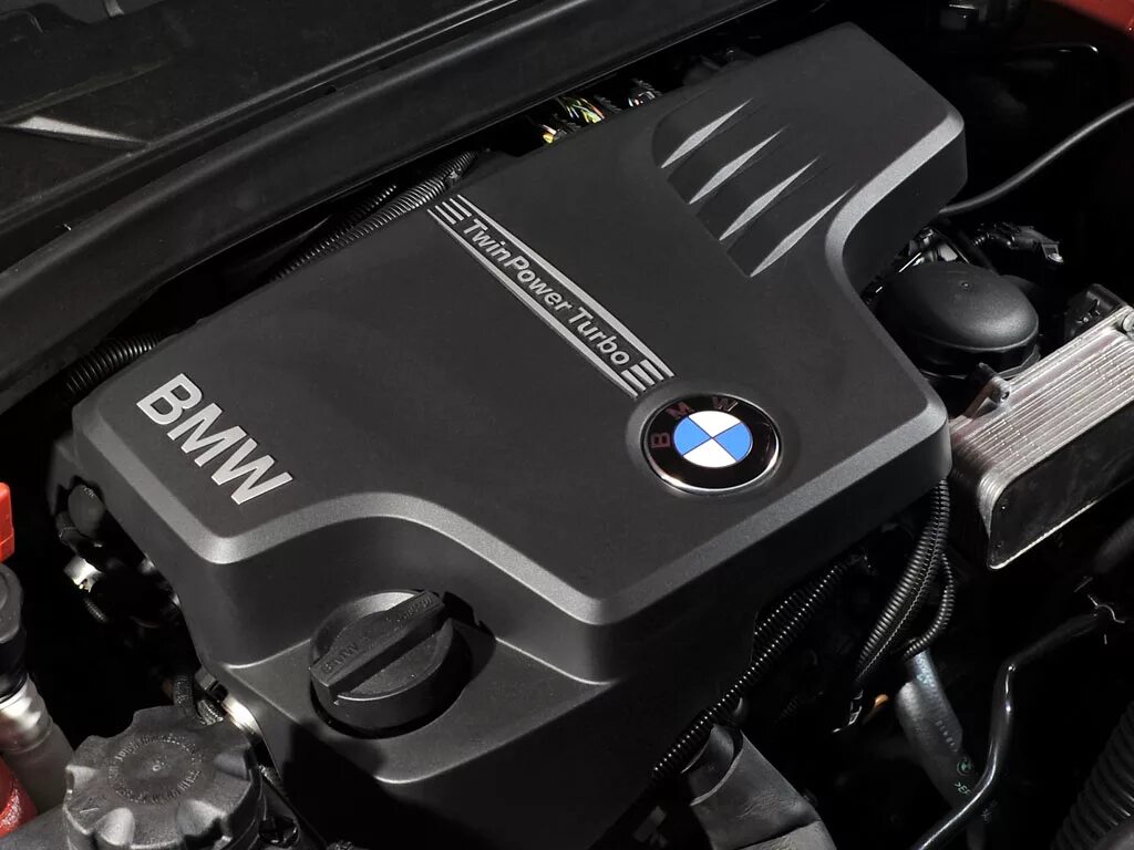 Новые двигатели бмв. BMW x1 Twin Power Turbo. BMW Twin Power Turbo. BMW n20b20. Мотор n 55 BMW Twin Power Turbo.