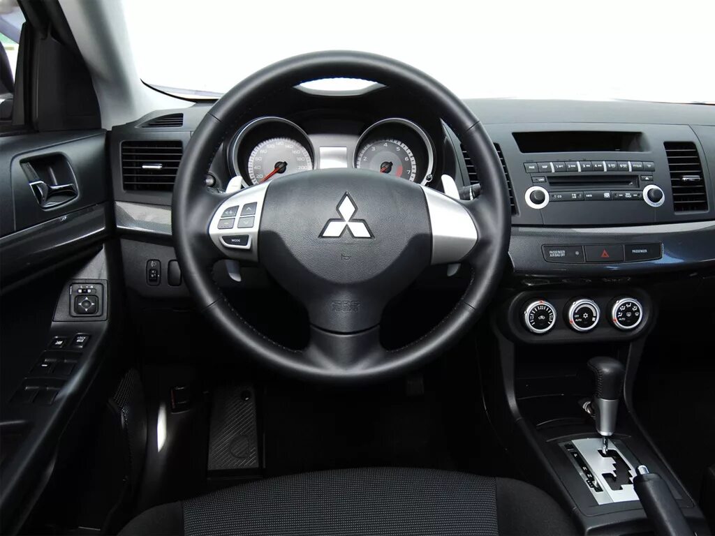 Лансер 10 автомат. Mitsubishi lancer 10 1. Митсубиси лансер 2008 салон. Лансер 10 автомат. Mitsubishi lancer 10 автомат.