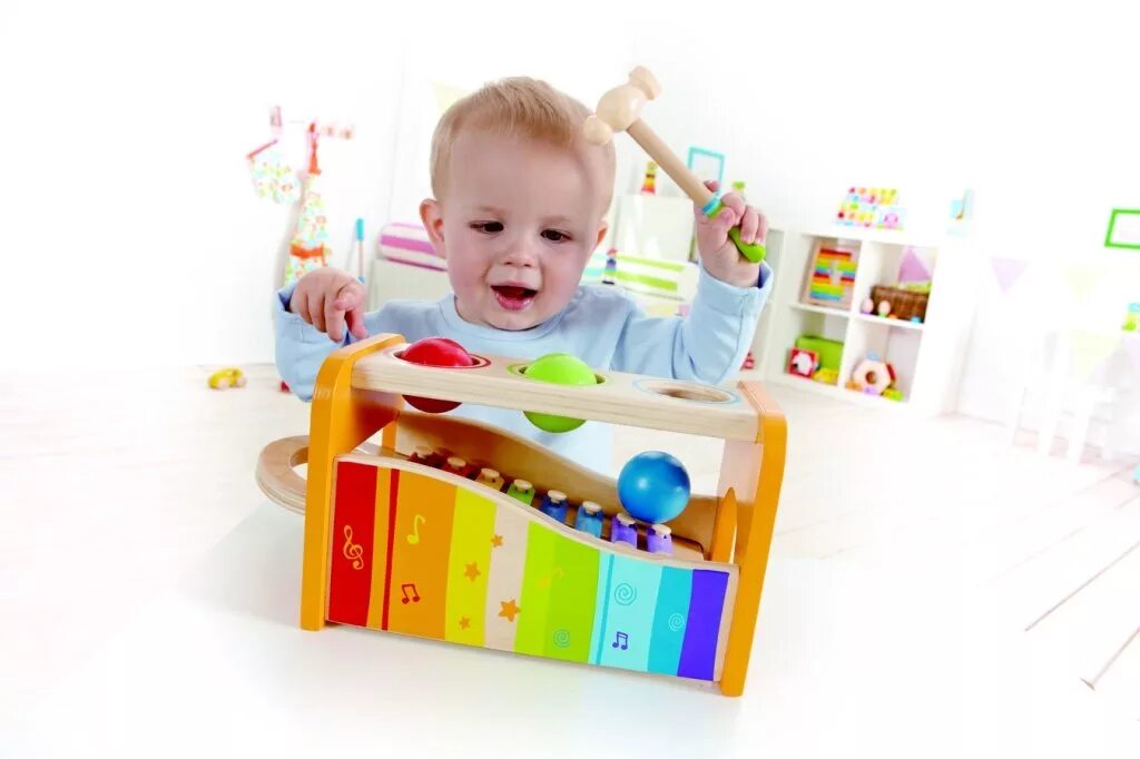 Hape ксилофон е0305 бежевый. Игровой центр брайт старс 360. Игрушки для годовалого. Пирамидка fisher-price слоник. Что интересно ребенку в 1 год.