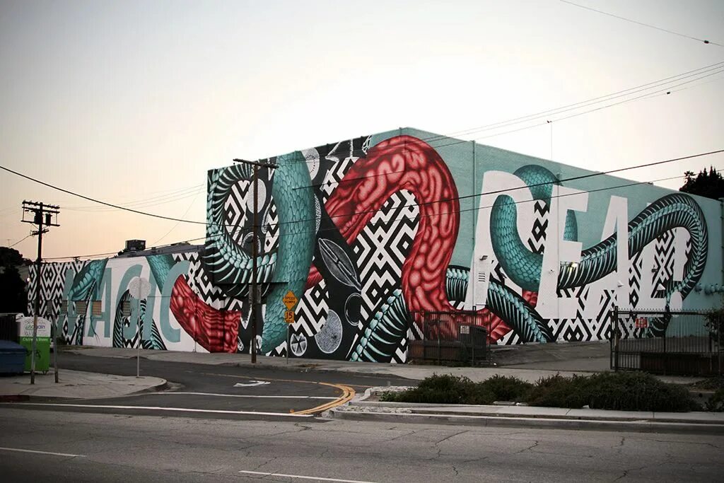 Уличные надписи на стенах. Street art is. Лос анджелес граффити парк. Граффити искусство. Гифки граффити.