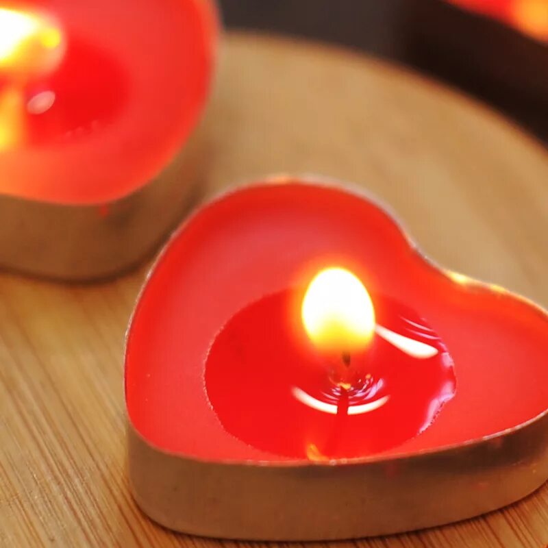сердце со свечей. свечи сердечки. свеча сердце. свечи сердечки. свеча в виде сердца.