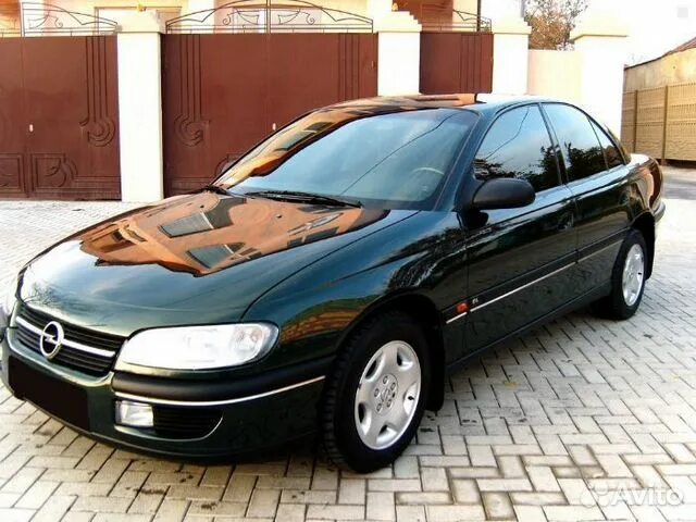 Купить опель омега б на авито. Opel Omega b 1997. Opel Omega 1997. Опель Омега 1999 года. Opel Omega b черная.