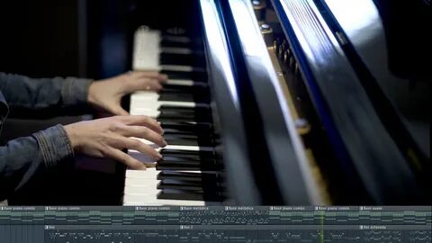 John playing the piano