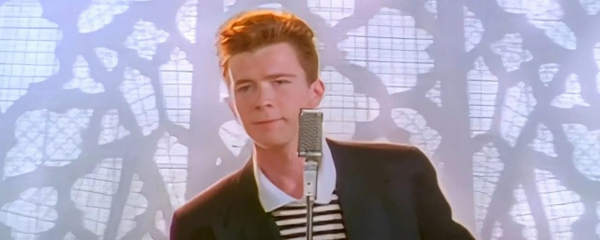 Gonna give you up rick astley. Рик эстли never gonna give. рик эстли never gonna give you. рик эстли 1987. рик эстли 2025.