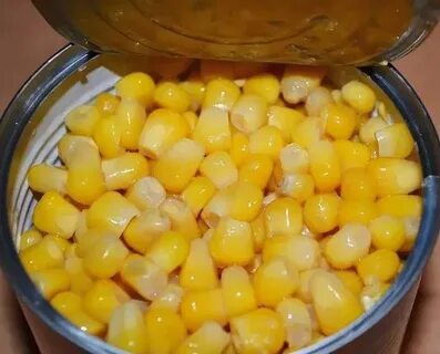 Открытая банка кукурузы