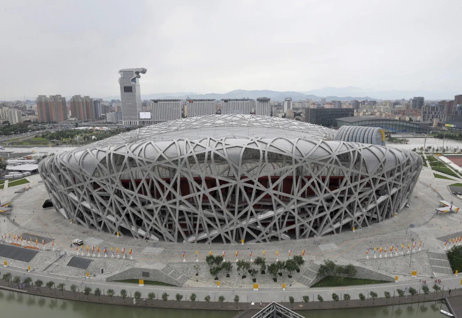 Стадион Птичье гнездо в Пекине. Национальный Олимпийский стадион в Пекине. Стадион «Птичье гнездо» (Пекин, Китай). Олимпийский стадион «Птичье гнездо».