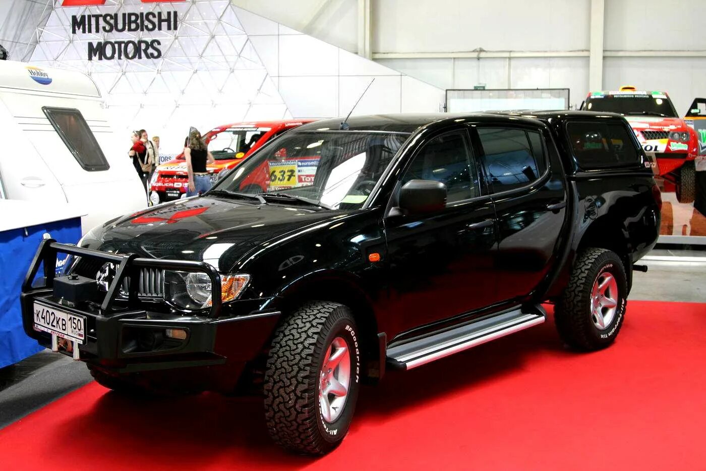 Какую полноприводную машину. Митсубиси л200. Mitsubishi l200 Tuning. Джип Mitsubishi Motors l200. Тюнинг л200.