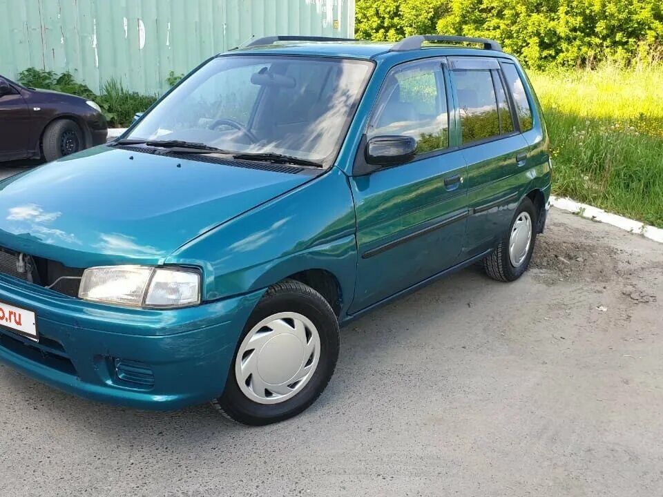 Mazda Demio 1998. Мазда Демио 1998 года. Mazda Demio 1.3 at, 1998. Демио Мазда зеленая 1998.