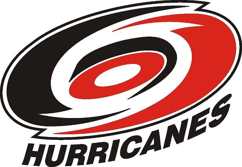 Download Carolina Hurricanes In Dark Wood Wallpaper Wallpapers.com