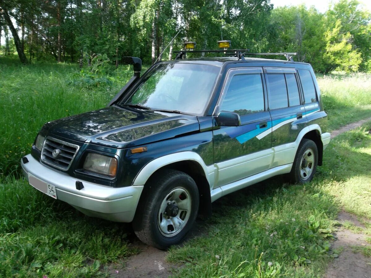 Купить мазду просид. Сузуки эскудо 1996. Сузуки эскудо, 1996 г.. Suzuki Escudo 1996 года. Мазда Просид Леванте.