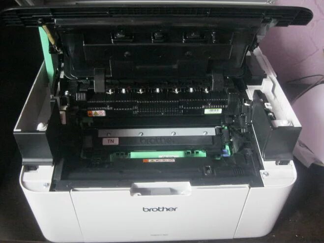Замена тонера brother. Принтер бротхер DCP-1510. Картридж для принтера brother DCP. Принтер brother 1510r чернила. Картриджи для принтера Бразер DCP 1510r.