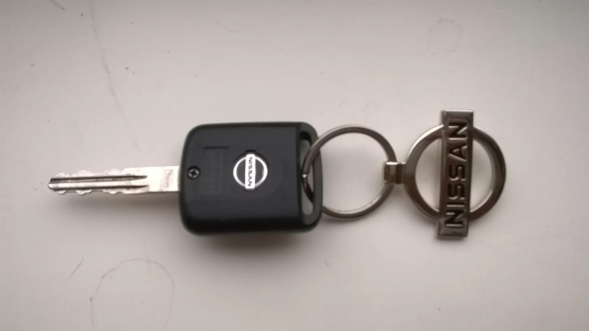 Ниссан ноут ключ зажигания. Nissan Note 2008 Key. Чип ключ Ниссан ноте 12. Батарейка в ключ Ниссан ноут.
