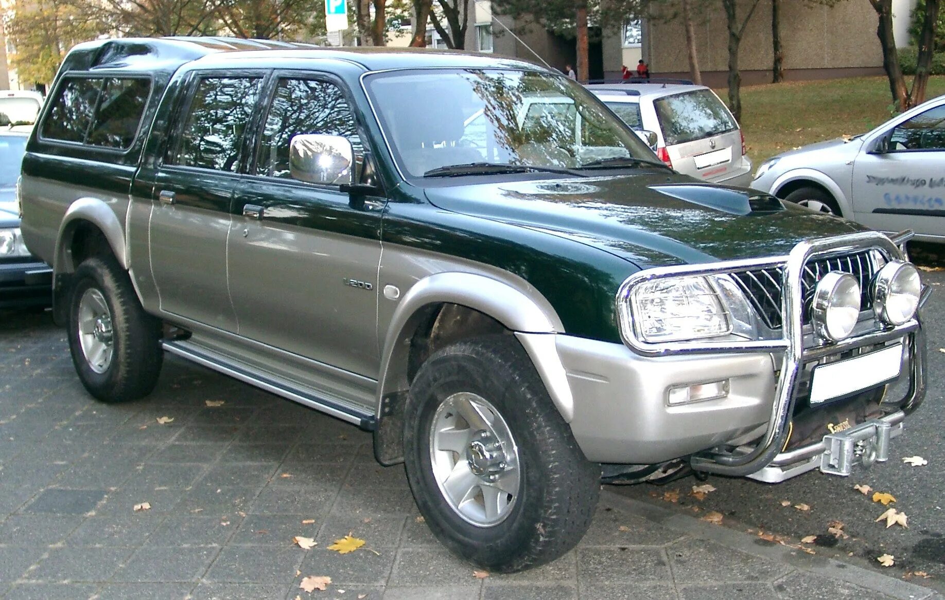 L200 2003 года. Митсубиси л200 2004. Митсубиси л200 2004. Митсубиси л200 2000г. Митсубиси л200 2004.