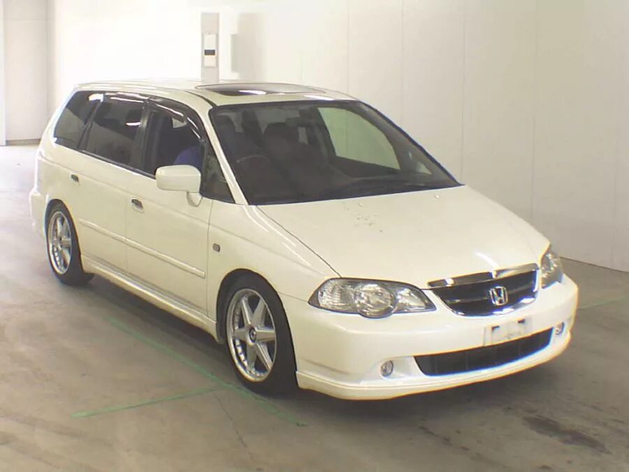 Хонда одиссей 2003 абсолют белый жемчуг. Honda odyssey 2003 usa. Honda odyssey 2003 года черный. Хонда одиссей 2003 голубой. Honda odyssey 2003.